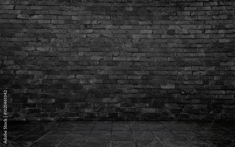 Fototapeta premium dark black concrete perspective room for advertising. stamp concrete floor in grid pattern with rustic black brick wall background. grey backdrop space for displayed product.