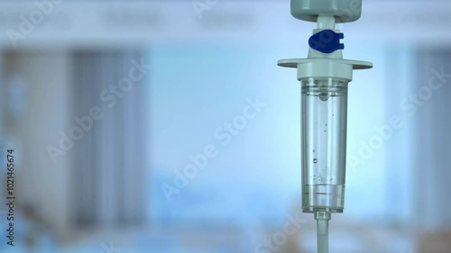 Dripping saline, Dripping medical perfusion close up equipment in clinic background, Medical equipment, Saline Solution IV Drip Fluid for Infusion in Hospital. Intravenous drip in operation room.