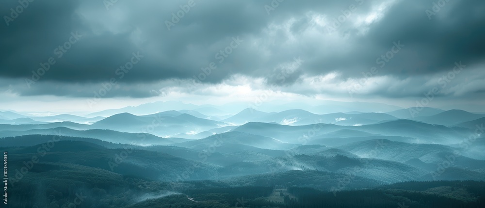 Fototapeta premium Overcast Sky with Rolling Clouds Over Mountains