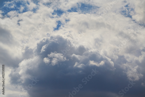 Large white cumulus cloud close-up aerial view