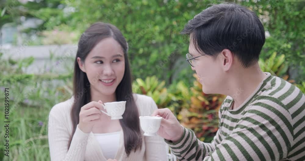 Happy Asian Family enjoy spending time to relaxing in the garden Happy Asian Family enjoy spending time to relaxing in the garden