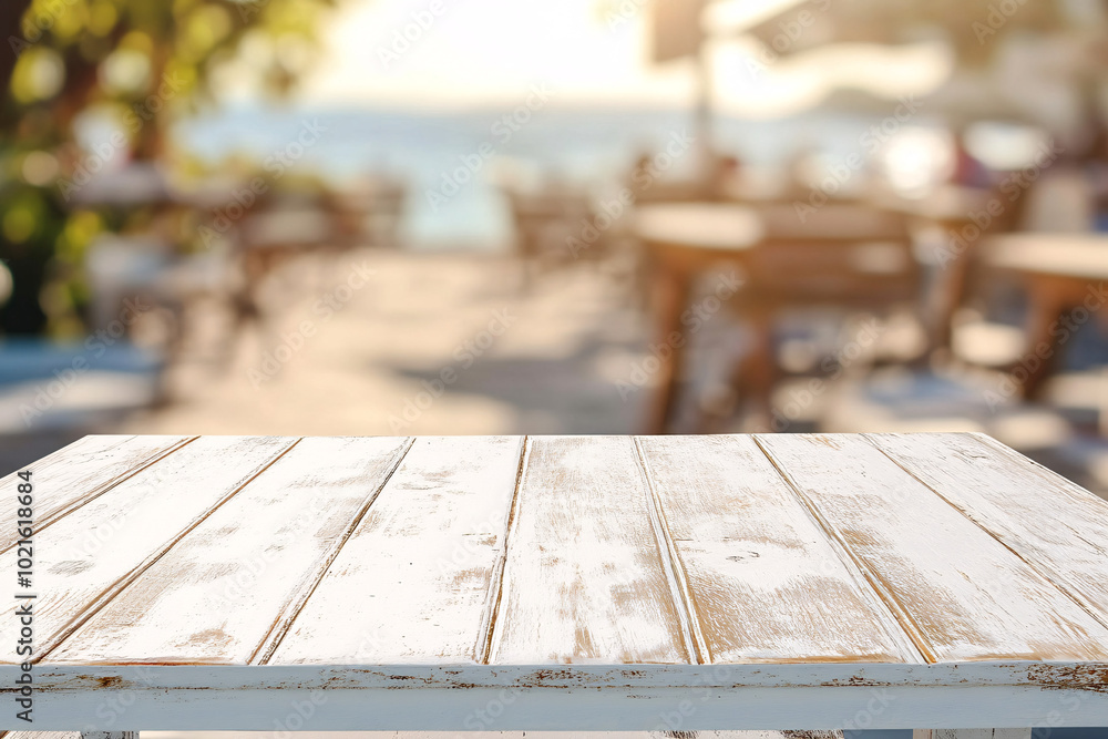 A weathered wooden table in a bright outdoor café setting with a blurred background of tables and nature in soft sunlight
A weathered wooden table in a bright outdoor café setting with a blurred background of tables and nature in soft sunlight