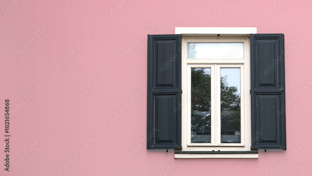 Fototapeta premium Open wooden shutters on powder pink wall. Rustic background idea concept. Wooden window village cottage house. Copy space, blank, empty.