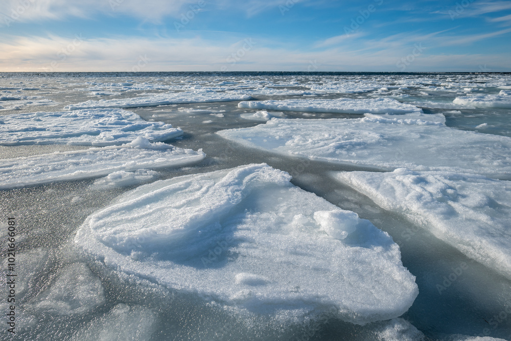 Frozen Northern Seascape with Split Ice on the Seawater Surface in Fractal Patterns in First Months of Winter