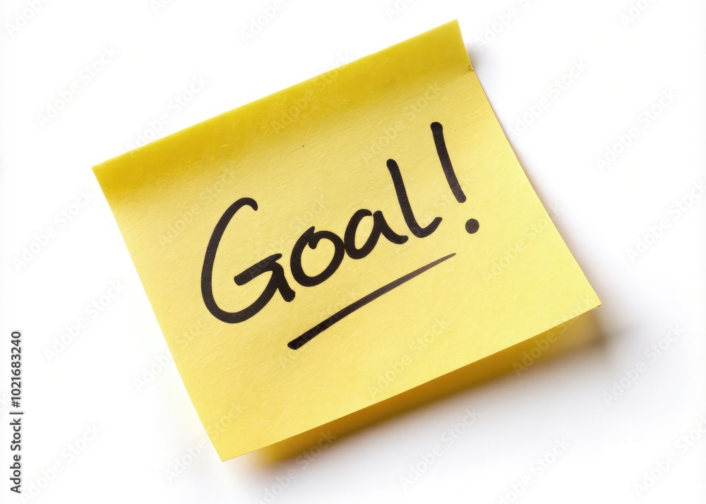 Sticky note with a prominently written goal placed on a white surface. Generative AI Sticky note with a prominently written goal placed on a white surface. Generative AI