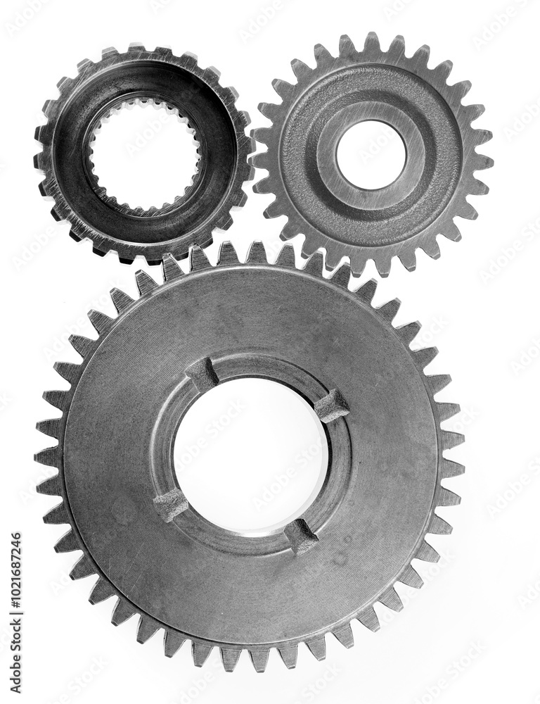 Three steel cog gears isolated on white Three steel cog gears isolated on white