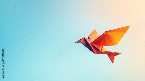 Colorful Origami Bird in Flight on Soft Blue Gradient Background, Symbolizing Creativity and Freedom Generative AI