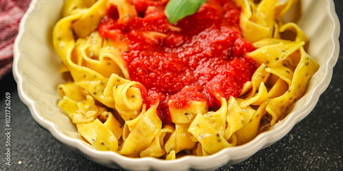 Pasta tagliatelle tomato sauce second course tasty food dish fresh delicious gourmet food background on the table rustic food top view copy space photo