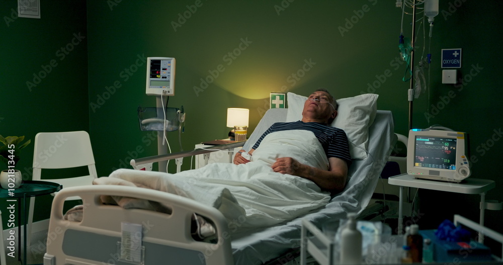 Elderly man resting in hospital, eyes closed, recovering from pneumonia with oxygen support. Elderly man resting in hospital, eyes closed, recovering from pneumonia with oxygen support.