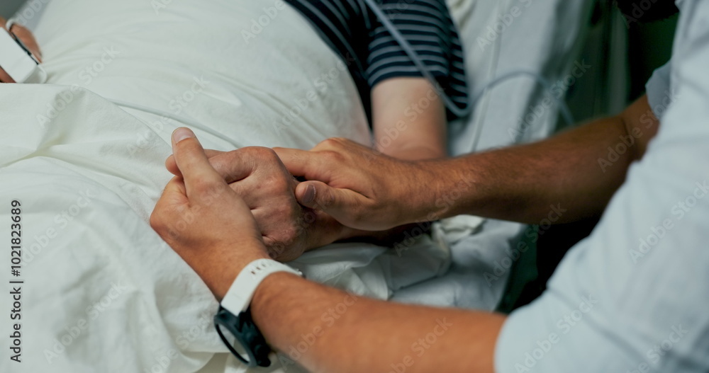 Father with an oxygen mask and his son share a quiet moment in a hospital room. Father with an oxygen mask and his son share a quiet moment in a hospital room.