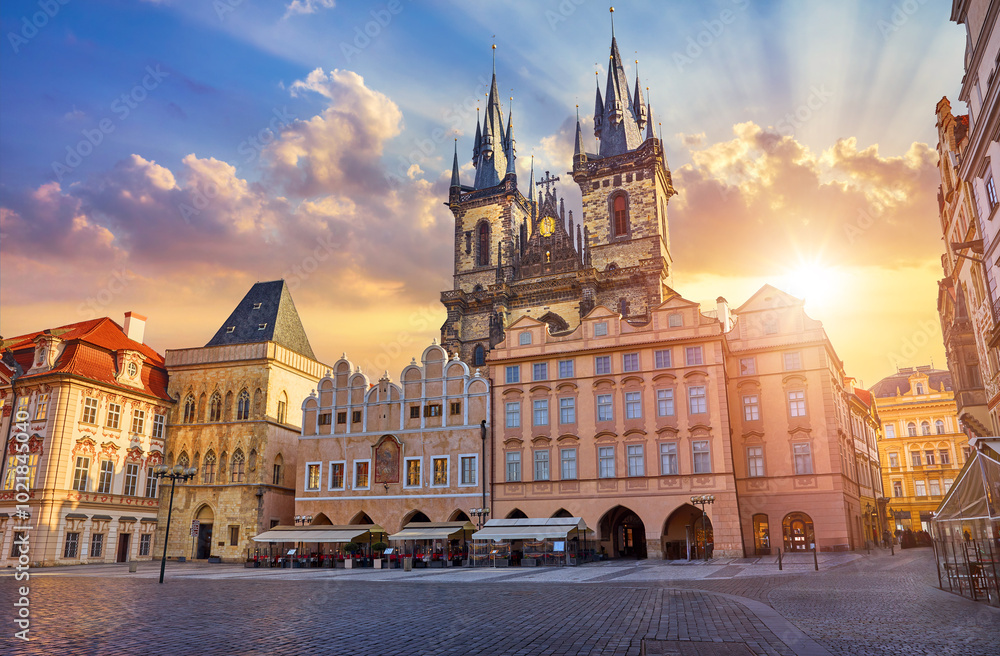 Fototapeta premium Prague, Czech Republic. Panoramic sunset view at Church of Our Lady Before Tyn the Old Town Square Praha city. Evening in prague, popular travel destination Europe.