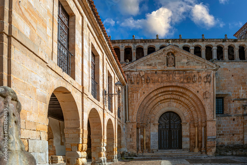 View of the impressive facade of the Romanesque collegiate church of Santa Juliana in Santillana del Mar, Cantabria, Spain