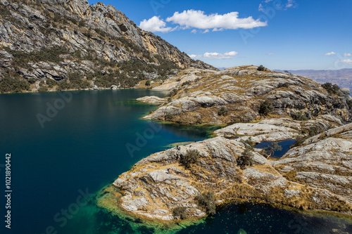 Obraz na płótnie The Turquoise Waters of Churup Lagoon with Tourists Aerial View in the Cordillera Blanca Mountain in the Huascaran National Park, in Ancash, Peru w salonie