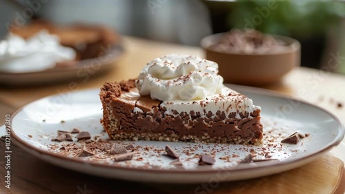 Wallpaper Mural Presenting a delicious slice of chocolate cake topped with whipped cream and chocolate shavings, showcasing the rich layers and textures Torontodigital.ca