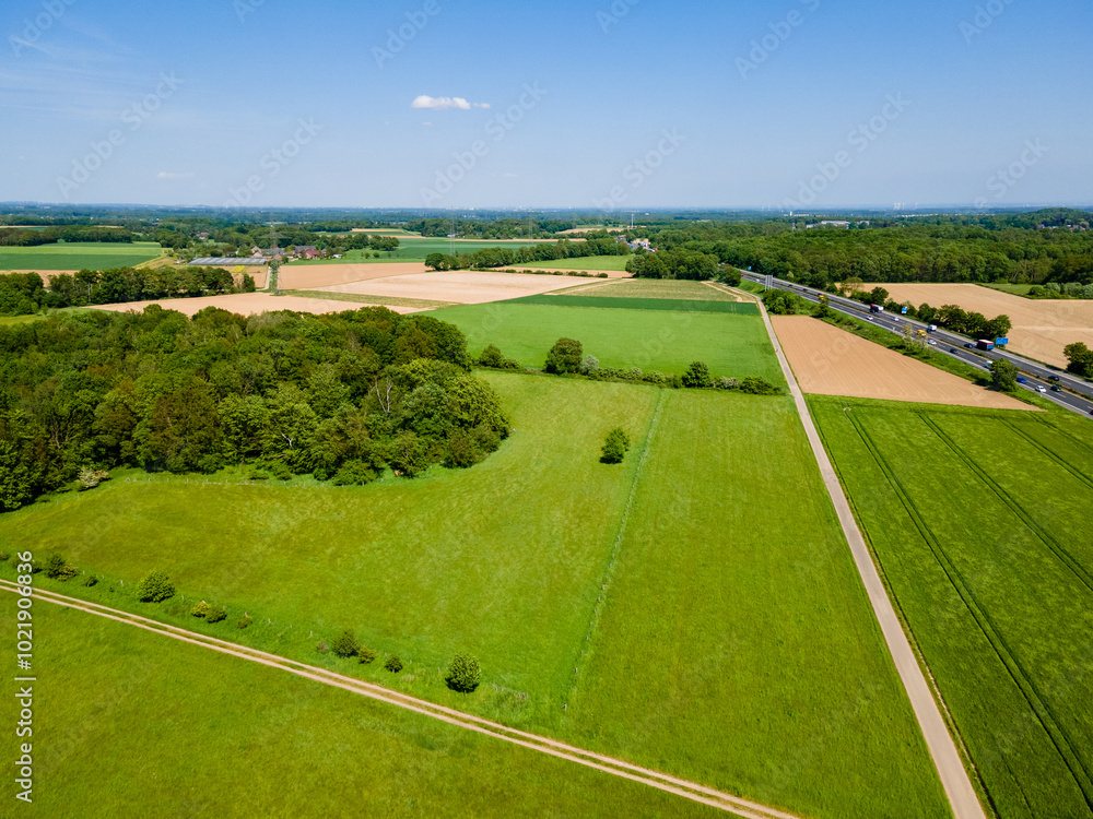 Farmland from above. Aerial view over green fields Farmland from above. Aerial view over green fields