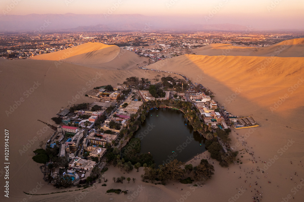 Dream-like Oasis Town in the Middle of Large Desert Dunes Known as Huacachina near Ica, Peru at Sunset