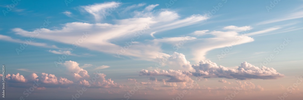 Celestial Dance: A breathtaking panorama of cloudscapes at sunrise, showcasing vibrant pastel hues and dynamic cloud formations. A serene and inspiring image perfect for travel, nature. Celestial Dance: A breathtaking panorama of cloudscapes at sunrise, showcasing vibrant pastel hues and dynamic cloud formations. A serene and inspiring image perfect for travel, nature.