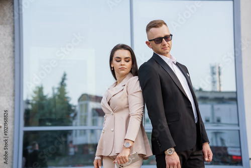 Wallpaper Mural Fashionable Elegance: A Stylish Couple in Modern Urban Setting Torontodigital.ca