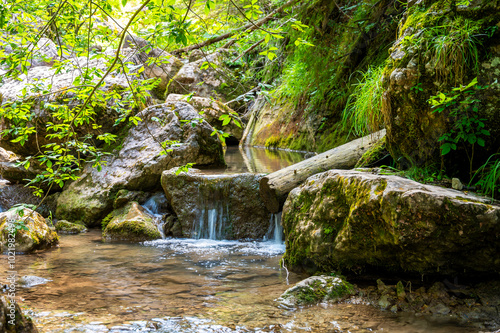 Water flowing between the stones