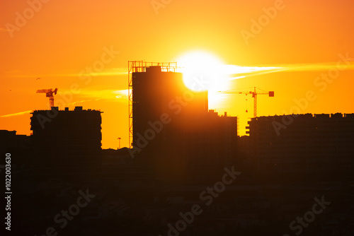 City skyline in the late afternoon with a beautiful sunset