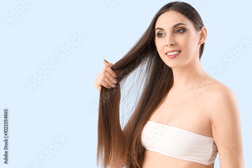 Young brunette woman with b...