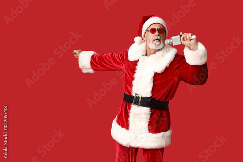 Santa Claus in sunglasses w...