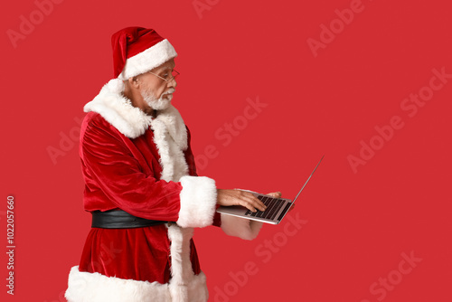 Santa Claus in glasses with...