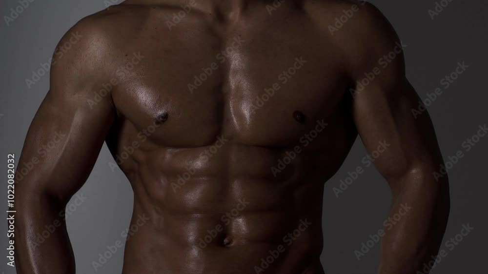 Male chest. Perfect abs, shoulders, and chest. Close up the Abs. Closeup torso. Ab. Muscular chest and ripped abs. Sexy male muscular body. Man with naked torso showing chest and six pack abs. Male chest. Perfect abs, shoulders, and chest. Close up the Abs. Closeup torso. Ab. Muscular chest and ripped abs. Sexy male muscular body. Man with naked torso showing chest and six pack abs.