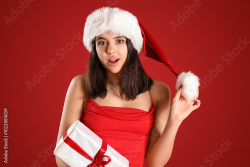 Attractive young woman in S...