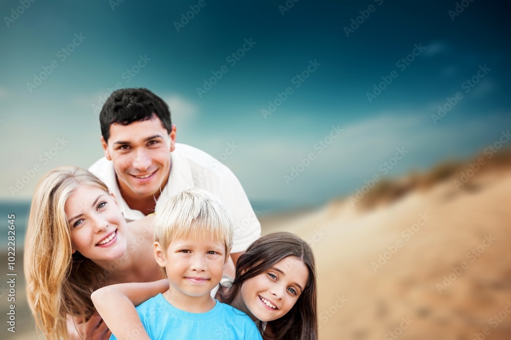 Happy young family with children at beach holiday Happy young family with children at beach holiday