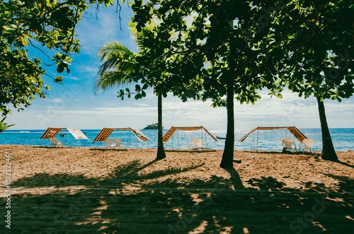 Landscape with sea view and boats with blue sky. Capurgana, Colombia.  photo