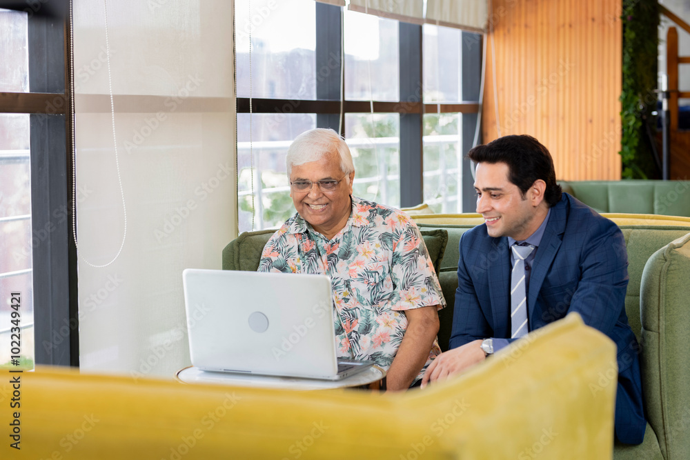 Office team working together on digital tablet analyzing online business project result, discussing data Office team working together on digital tablet analyzing online business project result, discussing data