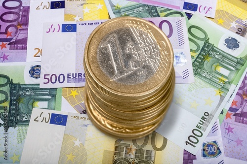 Various euro money and coins, banknote on desk photo