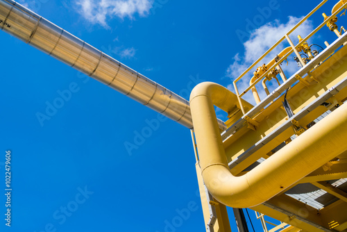 Oil and gas processing plant with pipe line valves.Steel pipelines and valves.Oil pipeline valves in the oil and gas industry.