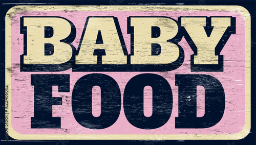 Aged and worn baby food sign on wood
