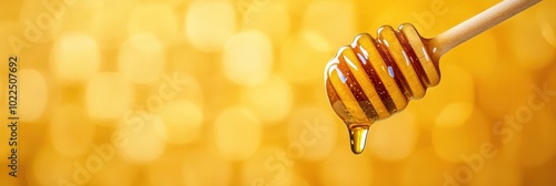 Close up of Golden Honey Dripping from a Wooden Dipper