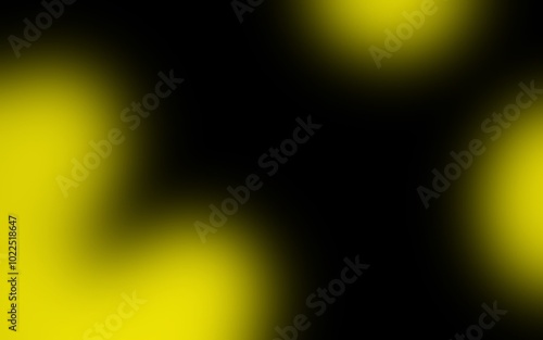 Dark gradient backdrop with bright light. Abstract yellow blurred background.