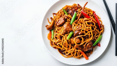 Delicious chow mein with chicken vegetables on white plate