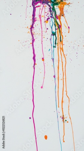 Colorful paint drips and splashes on a white background, showcasing artistic expression.