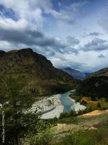 river flowing through the mountain valley