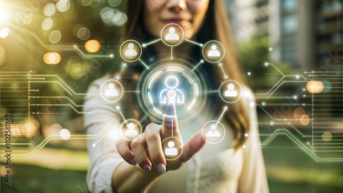 Woman interacting with digital interface in urban environment, sunlit background.