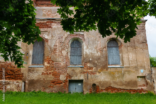 Ruins of an old brick synagogue on a cloudy summer day in Bykhov, Mogilev region, Belarus photo