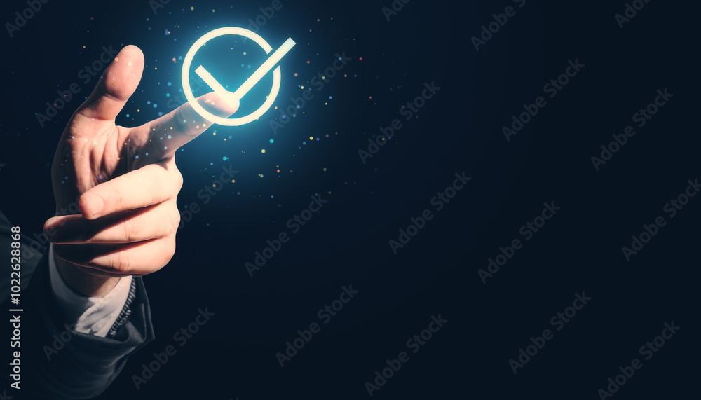 Male hand pointing at digital Guarantee Checkmark on dark background with mock up place. Compliance with regulations services and standards. Male hand pointing at digital Guarantee Checkmark on dark background with mock up place. Compliance with regulations services and standards.