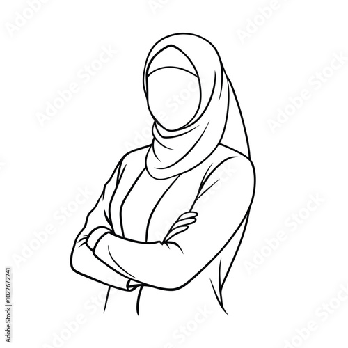 Businesswoman in hijab standing confidently with crossed arms