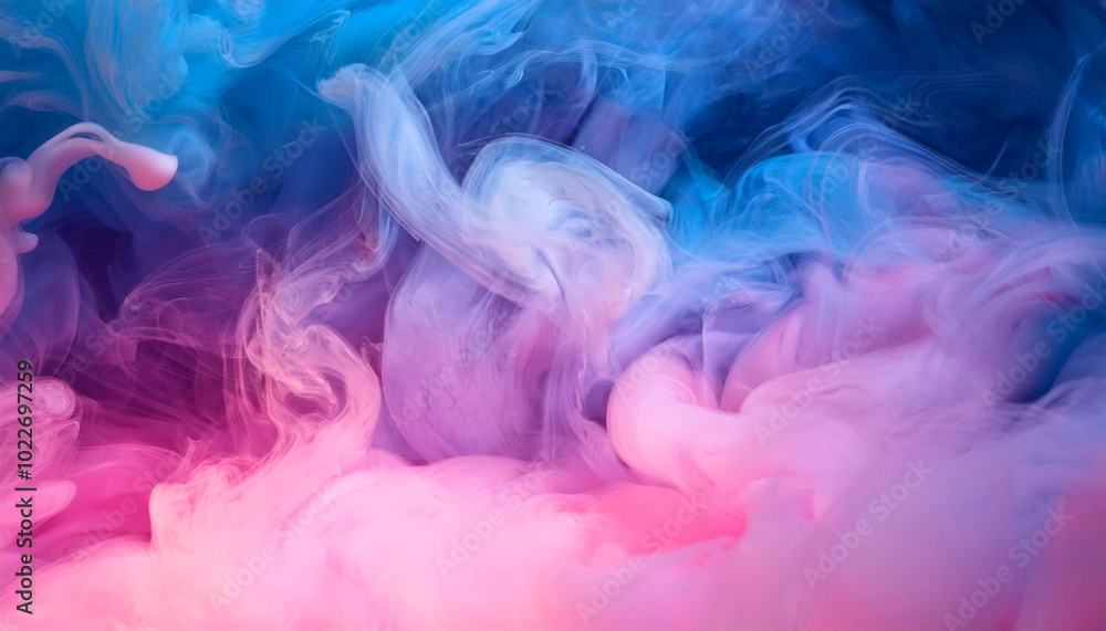 Fototapeta premium Swirling fog lit with pink and blue gels to create a multicolored background texture.