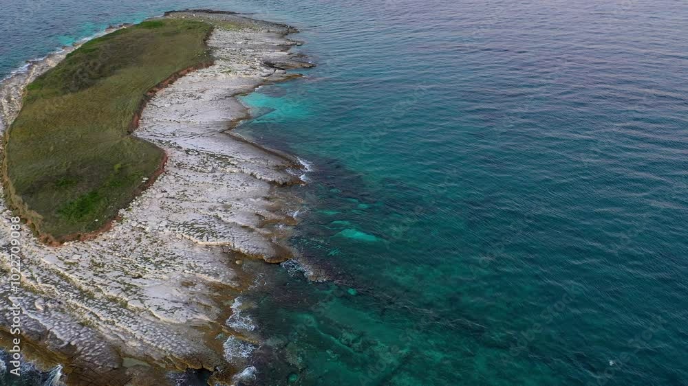 Aerial view of a remote island in the middle of the ocean Aerial view of a remote island in the middle of the ocean