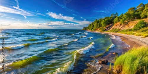 Fototapeta Naklejka Na Ścianę i Meble -  Serene Baltic Sea Landscape with Gentle Waves and Clear Blue Sky on a Sunny Day in Nature's Beauty