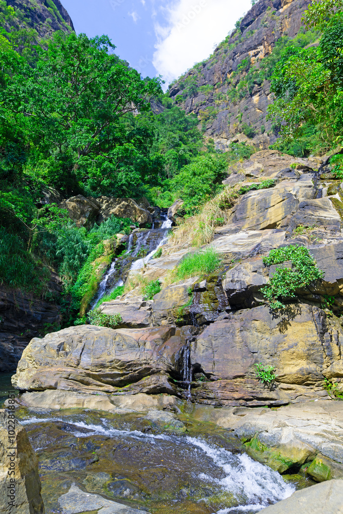 The Ravana Waterfall, in Wellawaya-Ella-Kumbalwela Hwy, Ella, Sri Lanka. The Ravana Waterfall, in Wellawaya-Ella-Kumbalwela Hwy, Ella, Sri Lanka.