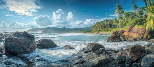 A High Resolution Panorama Of A Coastal Landscape With Huge Stone Formations In The Foreground Ocean Surf Washes Over The Rocky Shore A Rainforest Of Palm Trees Grows On The Hills On The Coastline