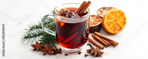 Festive Mulled Wine with Cinnamon Sticks and Christmas Spices, Cozy Holiday Vibes, Isolated on White Background photo